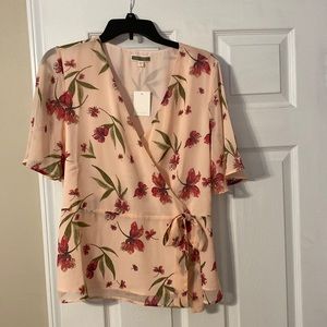 Pink floral peplum style shirt